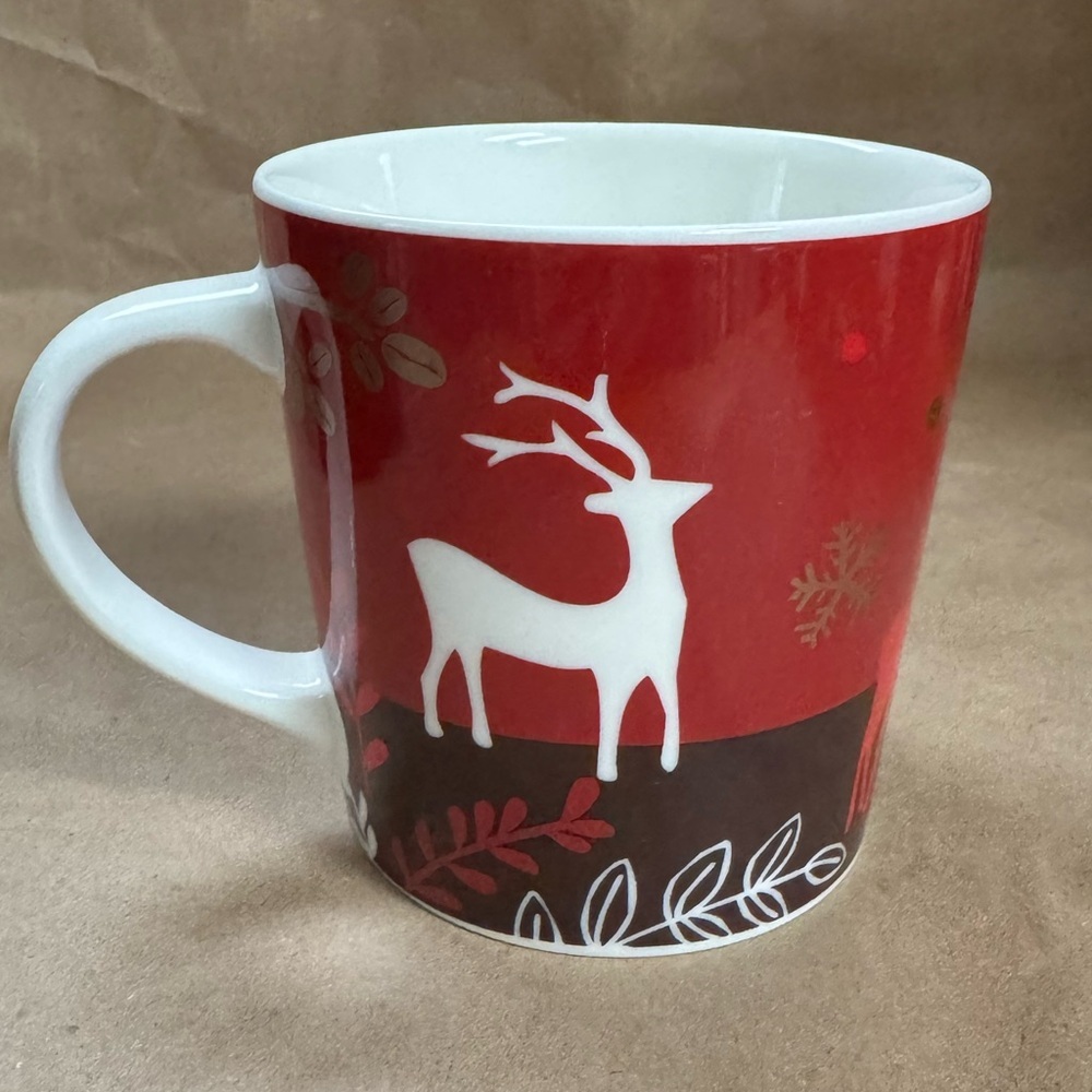 2009 Starbucks Red & Brown Reindeer & Coffee Beans Holiday Mug. 16 fl oz.